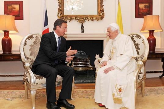 Pope Benedict XVI (R) meets with British Prime Minister David Cameron at Archbishop's House, in central London, on September 18, 2010. Pope Benedict XVI is 'very calm' and 'no one felt threatened' despite the arrest of six men linked to an alleg...
