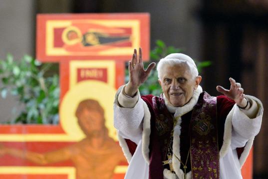 Pope Benedict XVI blesses as arrives for the prayer with the ecumenical christian community of Taize during their European meeting, on December 29, 2012, in St.Peter's square at the Vatican. The Taize community, based in the eastern French villa...