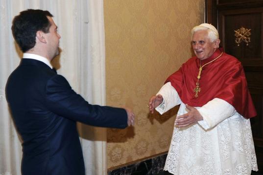 Pope Benedict XVI (R) greets Russian President Dmitry Medvedev during an audience at The Vatican on December 3, 2009. Russia and the Vatican have established full diplomatic relations ending longstanding tensions, the Kremlin announced afterMedv...