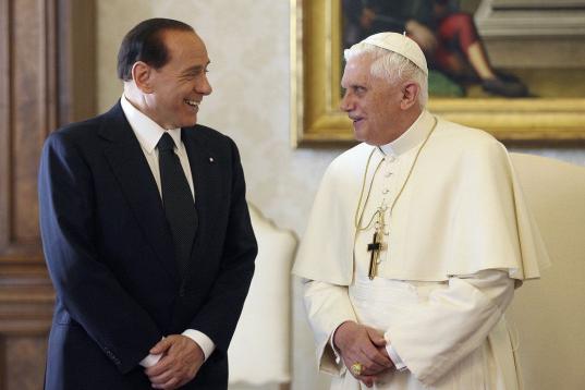 VATICAN CITY - NOVEMBER 19: Pope Benedict XVI (R) talks with Italian Prime Minister Sivio Berlusconi during their  meeting November 19, 2005 in Vatican City. This is the first meeting between the two since teh Pope's election.  (Photo by Alberto...