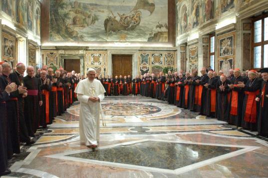 VATICAN CITY, Vatican:  Cardinals applaud Pope Benedict XVI during a meeting with the cardinals of the Roman Catholic Church 22 April 2005 in the Vatican City. The Popewarmly thanked the cardinals telling them he needed their advice and support ...