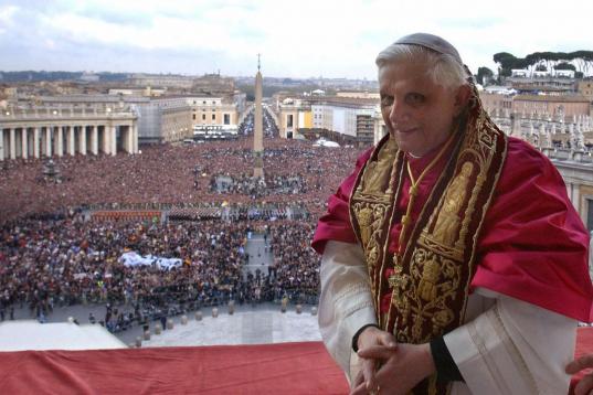 VATICAN CITY, Vatican:  Pope Benedict XVI, Cardinal Joseph Ratzinger of Germany, appears on the balcony of St Peter's Basilica in the Vatican after being elected by the conclave of cardinals, 19 April 2005. AFP PHOTO POOL Osservatore Romano Artu...