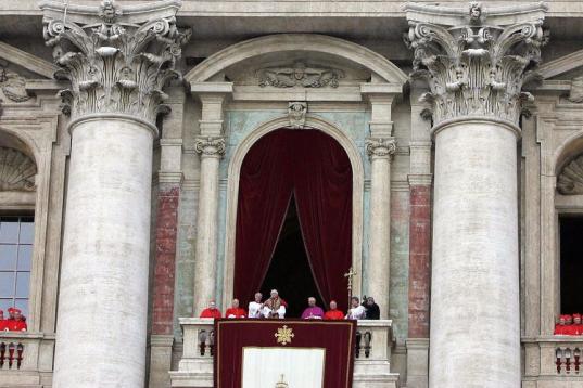 VATICAN CITY, Vatican:  Germany's Joseph Ratzinger, Pope Benedict XVI, appears at the window of the main balcony after being elected the 265th pope of the Roman Catholic Church 19 April 2005 at the Vatican City. AFP PHOTO PATRICK HERTZOG  (Photo...