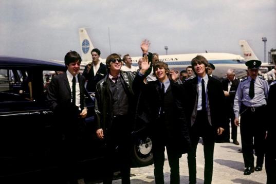 The Beatles arrive at London Airport: (l-r) Paul McCartney, John Lennon, Ringo Starr and George Harrison.