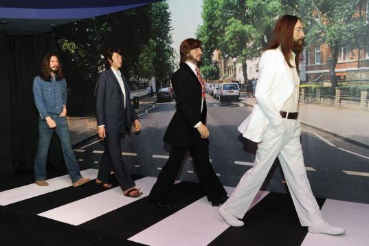 Wax figures representing The Beatles, from left, George Harrison, Paul McCartney, Ringo Starr and John Lennon are unveiled at Madame Tussauds New York, Thursday June 14, 2012, in New York. (Photo by Evan Agostini/Invision/AP)