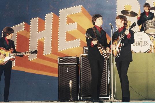 FILE - In this June 30, 1966 file photo, the Beatles perform at Budokan Hall in Tokyo for the first time. From left: George Harrison, Paul McCartney, John Lennon and Ringo Starr. McCartney turned 70 years of age Monday June 18, 2012. (AP Photo/File)