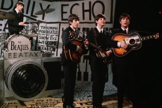 England, Circa 1963, British pop group 'The Beatles' are pictured performing together, L-R: Ringo Starr (drums), George Harrison (guitar), Paul McCartney (bass guitar) and John Lennon (guitar)  (Photo by Bob Thomas/Getty Images)