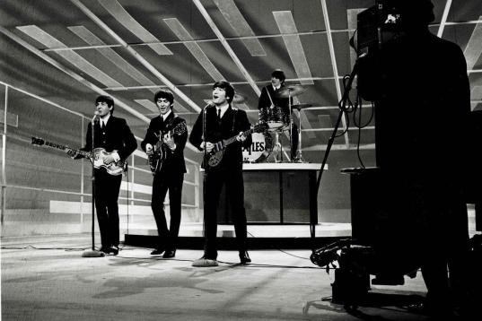 Volume 2, Page 85, Picture 6, The Beatles, America, February 1964, The Beatles perform on the 'Ed Sullivan show'  (Photo by Popperfoto/Getty Images)