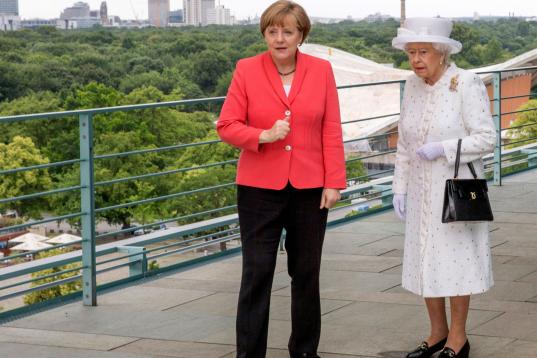 Con Merkel, en Berlín.