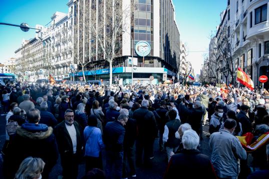 MADRID SPAIN, SPAIN - FEBRUARY 20: Several people demonstrate in support of Diaz Ayuso, at the headquarters of the Popular Party, on 20 February, 2022 in Madrid, Spain. PP supporters have come to Genova street, to demand the resignation of the p...