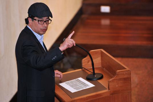Bogota Mayor, former April 19 (M-19) guerrilla movement member Gustavo Petro, takes part in a public hearing on July 24, 2012, in the courts of the State Council, at the Palace of Justice in Bogota, Colombia. Petro faces a lawsuit loss of invest...
