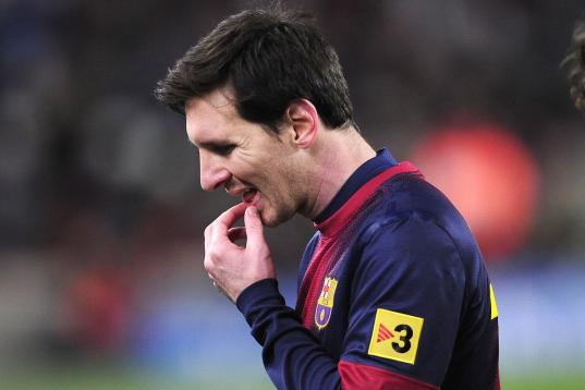 FILE - In this Feb. 26, 2013 file photo, Barcelona's Lionel Messi from Argentina reacts after losing the Copa del Rey soccer match between FC Barcelona and Real Madrid at the Camp Nou stadium in Barcelona, Spain. A state prosecutor for the north...