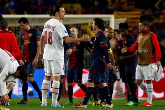 PSG's Zlatan Ibrahimovic, from Sweden, left, shakes hands with Barcelona's Lionel Messi, from Argentina, at the end of the Champions League quarterfinal second leg soccer match between FC Barcelona and Paris Saint-Germain FC at the Camp Nou stad...