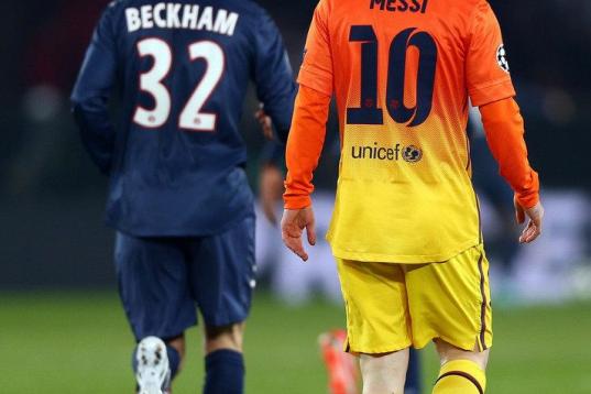 PARIS, FRANCE - APRIL 02:  Lionel Messi of Barcelona and David Beckham of Paris Saint-Germain during the UEFA Champions League Quarter Final match between Paris Saint-Germain and Barcelona FCB at Parc des Princes on April 2, 2013 in Paris, Franc...