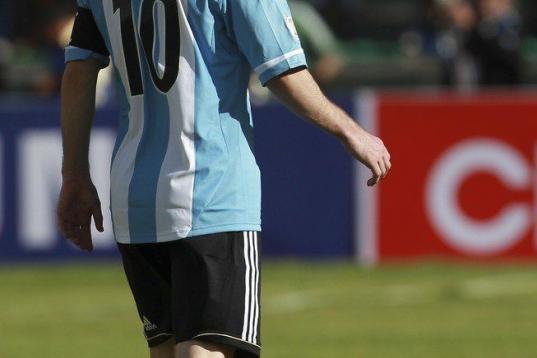 Argentina's Lionel Messi reacts during a World Cup 2014 qualifying soccer match against Bolivia in La Paz, Bolivia, Tuesday, March 26, 2013. (AP Photo/Juan Karita)