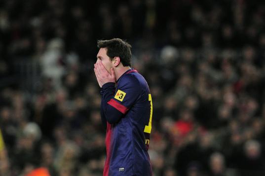 Barcelona's Argentinian forward Lionel Messi reacts during the Spanish Cup semi-final second-leg football match FC Barcelona vs Real Madrid CF at the Camp Nou stadium in Barcelona on February 26, 2013.  AFP PHOTO / JOSEP LAGO        (Photo credi...