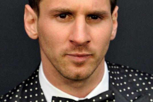 ZURICH, SWITZERLAND - JANUARY 07:  Lionel Messi of Argentina poses during the red carpet arrivals of the FIFA Ballon d'Or Gala 2013 at Congress House on January 7, 2013 in Zurich, Switzerland.  (Photo by Harold Cunningham/Getty Images)