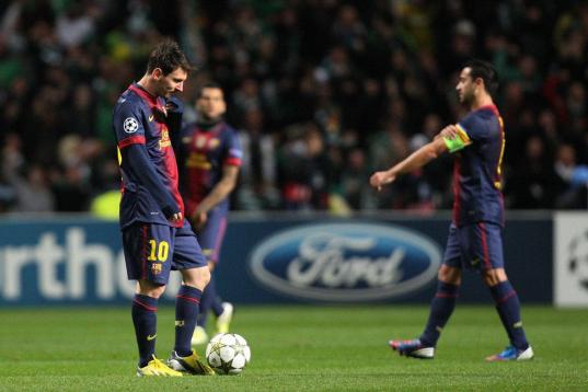 Barcelona's Lionel Messi, left, stand's dejected after Celtic's Victor Wanyama, scores a goal during their Champions League Group G soccer match at Celtic Park, Glasgow, Scotland, Wednesday Nov. 7, 2012. (AP Photo/Scott Heppell)