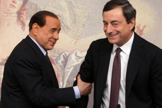 Con Berlusconi, en 2008.