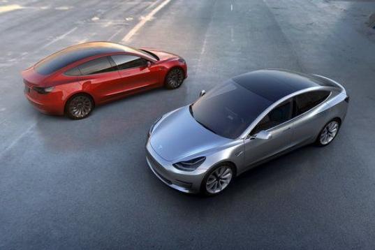 A Tesla Motors Model 3 electric cars are seen in this handout picture from Tesla Motors on March 31, 2016.
