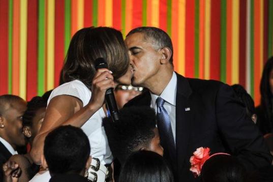 Obvio con su mujer, la Primera Dama, Michelle Obama.