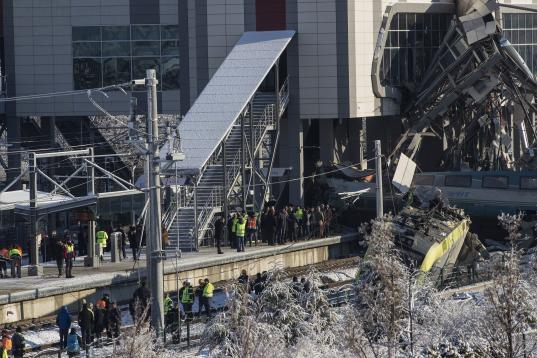 ANKARA, TURKEY - DECEMBER 13 : Crash site is seen after high-speed train crashed in Turkish capital Ankara on December 13, 2018. At least seven people were killed and 43 injured when a high-speed train crashed into a pilot engine traveling along...