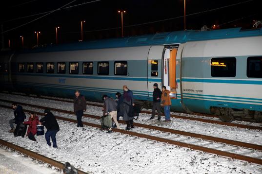 ANKARA, TURKEY - DECEMBER 13 :  Passengers leave the high-speed train after it crashed in Turkish capital Ankara on December 13, 2018. (Photo by Dogukan Keskinkilic/Anadolu Agency/Getty Images)