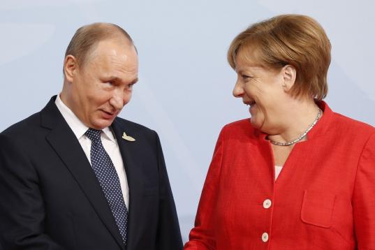 Merkel y el presidente ruso, Vladimir Putin