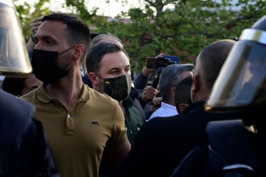 Leader of far-right party Vox, Santiago Abascal (C) arrives for the presentation of their candidate for Madrid Regional election in the Madrid's suburb of Vallecas on April 7, 2021. (Photo by JAVIER SORIANO / AFP) (Photo by JAVIER SORIANO/AFP vi...