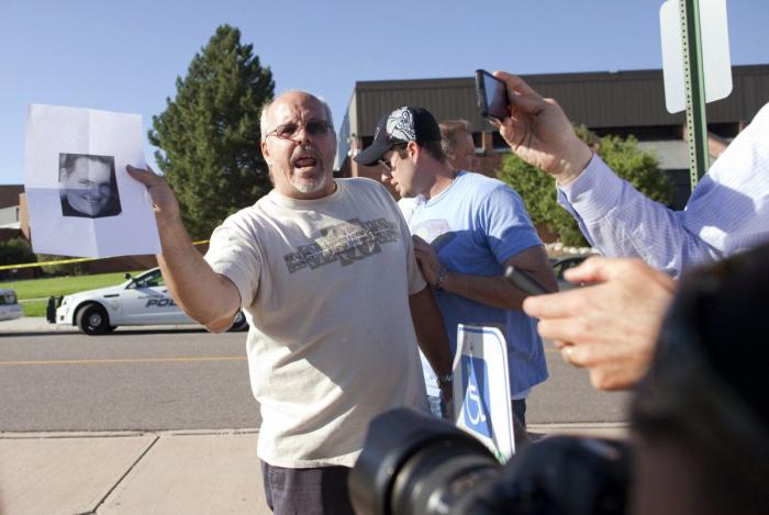 Tiroteo en Denver: Obama y Romney cancelan los actos electorales por la matanza de Colorado (FOTOS)