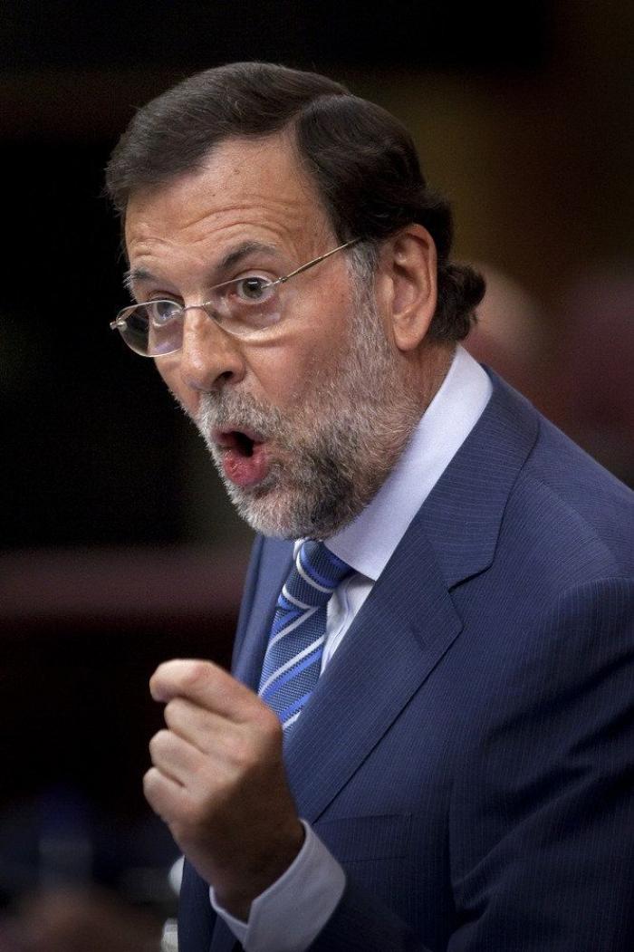El chapuzón veraniego de Rajoy y otras fotos de sus vacaciones en Ibiza