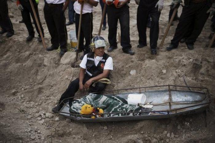 Ascienden a 131 los muertos por el alud en Guatemala