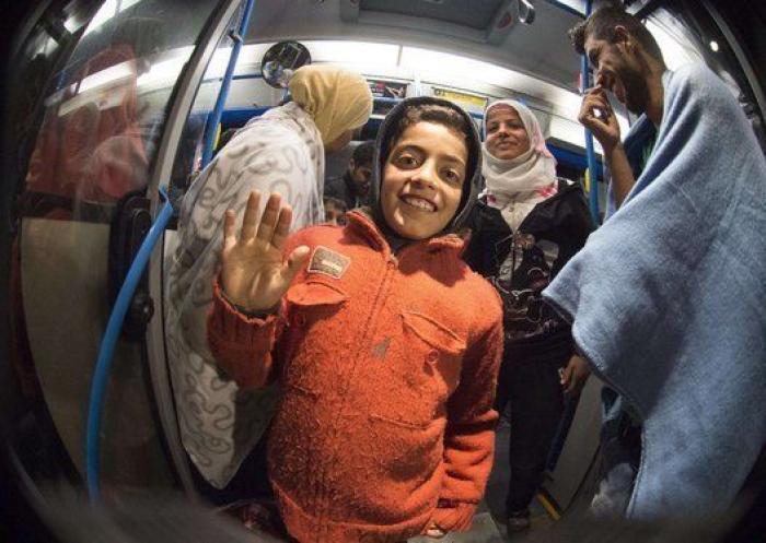 Persecución, caminata, lluvia... y las primeras sonrisas de los refugiados (FOTOS)