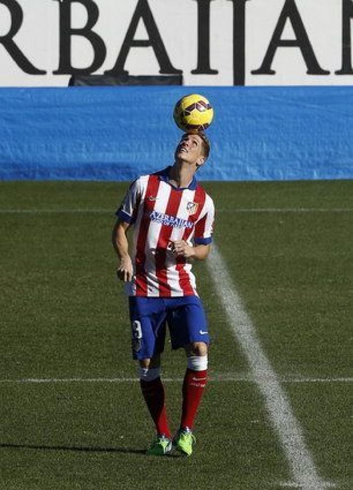 Fernando Torres vuelve a vestir de rojiblanco ante 40.000 aficionados (FOTOS)