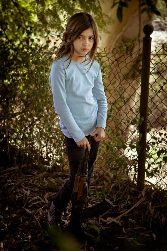 Fotografías de niños de EEUU con armas para denunciar la masacre de Newtown un año después