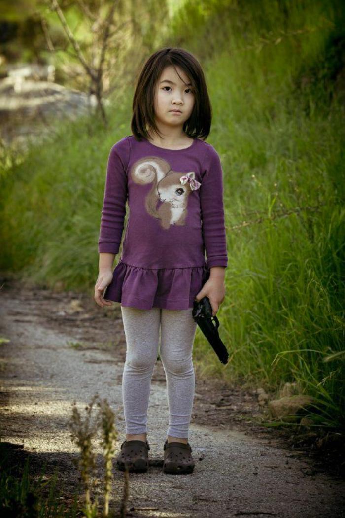 Fotografías de niños de EEUU con armas para denunciar la masacre de Newtown un año después