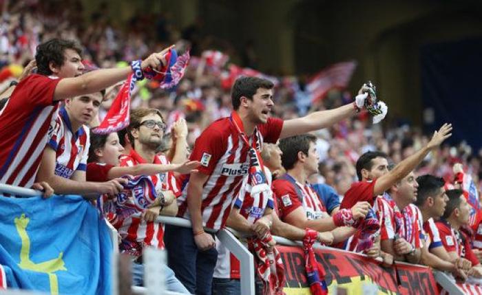 Las fotos de la aficiones del Real Madrid y del Atlético de Madrid