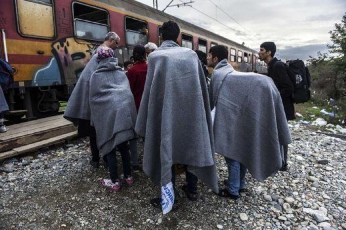 La lluvia y el frío complican el éxodo de los refugiados (FOTOS)