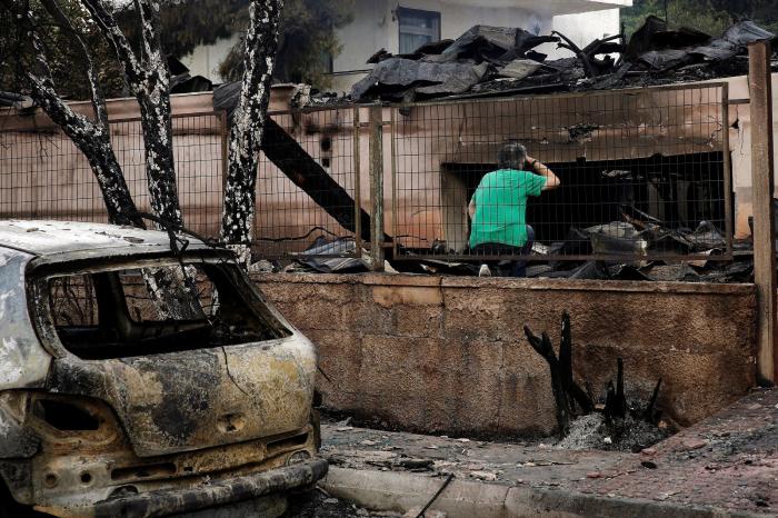 Al menos 80 muertos y 187 heridos en los graves incendios que arrasan Grecia