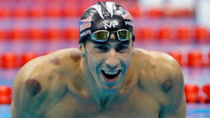 Un fotógrafo capta la cara que se le queda al gran rival de Phelps cuando ve que va a perder