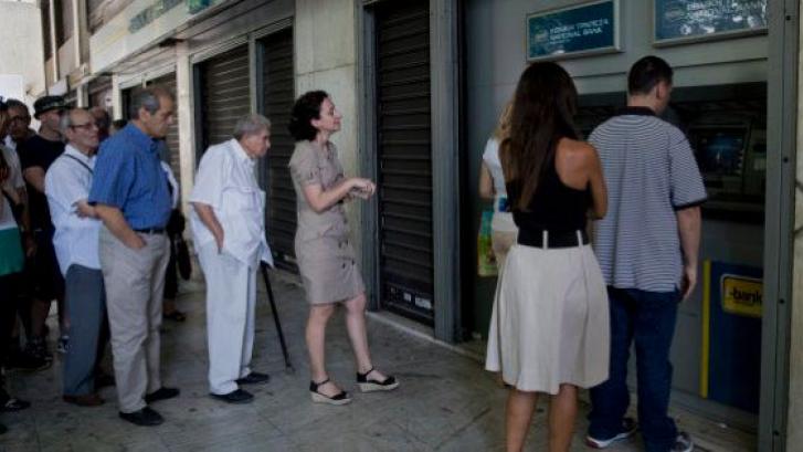 El lunes griego: reapertura de bancos, Ejecutivo reformado y subida de impuestos