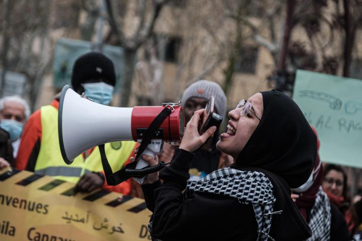 BARCELONA, SPAIN - 2022/03/19: A protester speaks to the audience through a megaphone during the demonstration. People took to the Streets of Barcelona to protest against fascism and racism. (Photo by Ricard Novella/SOPA Images/LightRocket via Getty Images)