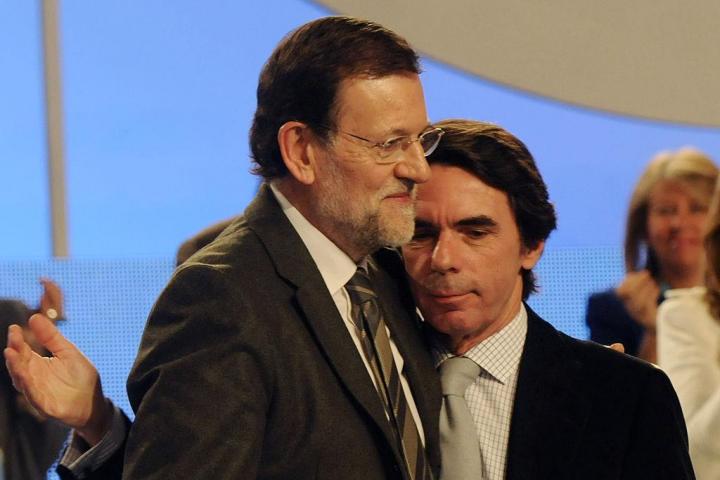 Mariano Rajoy y José María Aznar, en una foto de 2012.