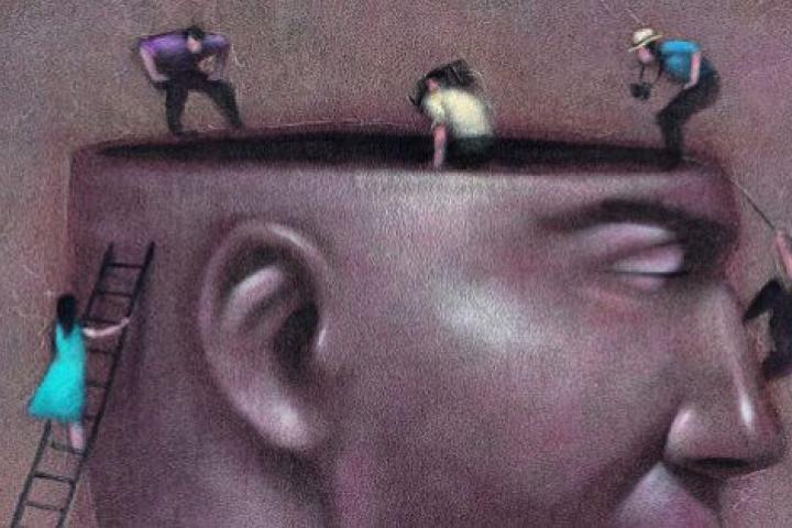 People Looking in Man's Head