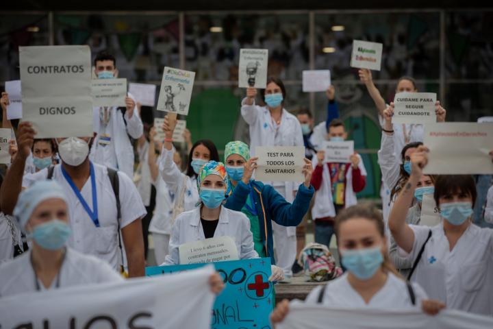 BARCELONA, SPAIN - MAY 12: Dozens of health worker protest to stop the job cuts and ask for tests to detect coronavirus during the gathering of health workers on International Nursing Day at gates of the Vall d'Hebron Hospital, on May 12, 2020 i...