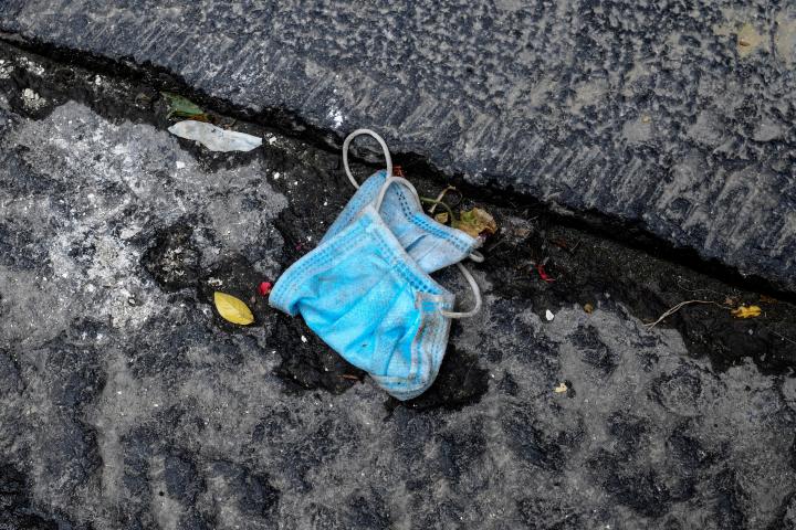 NAPLES, CAMPANIA, ITALY - 2020/05/14: An obviously worn-out mouth and nose protection mask lies thrown away on the street, in Naples city. (Photo by Salvatore Laporta/KONTROLAB/LightRocket via Getty Images)