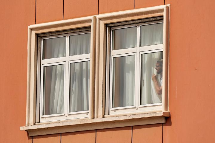 LA CORUNA, SPAIN - JULY 21:  Chico Flores of CF Fuenlabrada looks out the Hotel Finisterre window, place where the CF Fuenlabrada players who have tested positive for Covid-19 on July 21, 2020 in La Coruna, Spain. (Photo by Jose Manuel Alvarez/Q...