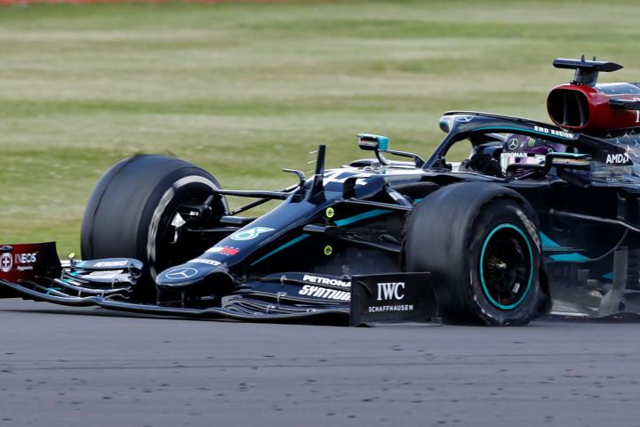 Mercedes' British driver Lewis Hamilton punctures near the finish of the Formula One British Grand Prix at the Silverstone motor racing circuit in Silverstone, central England on August 2, 2020. - Lewis Hamilton wins record seventh British Grand...