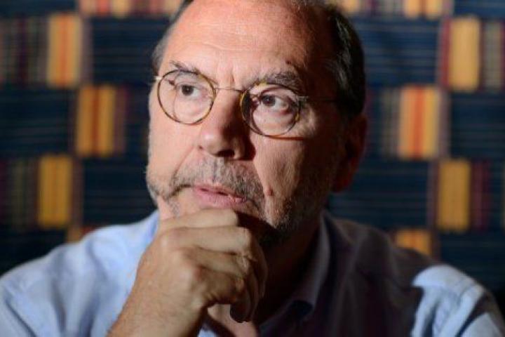 Professor Peter Piot, the Director of the London School of Hygiene and Tropical Medicine, speaks during an interview at his office in central London, England, on July 30, 2014.  Professor Piot was one of the co-discoverers of the Ebola virus dur...