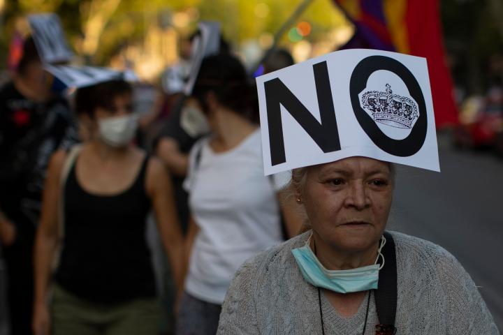 Demonstrators march during a protest against Spanish Monarchy in Madrid, Spain, Saturday, July 25, 2020.  A barrage of media leaks have revealed how the king's father, former monarch Juan Carlos I, allegedly hid millions of untaxed euros in offs...